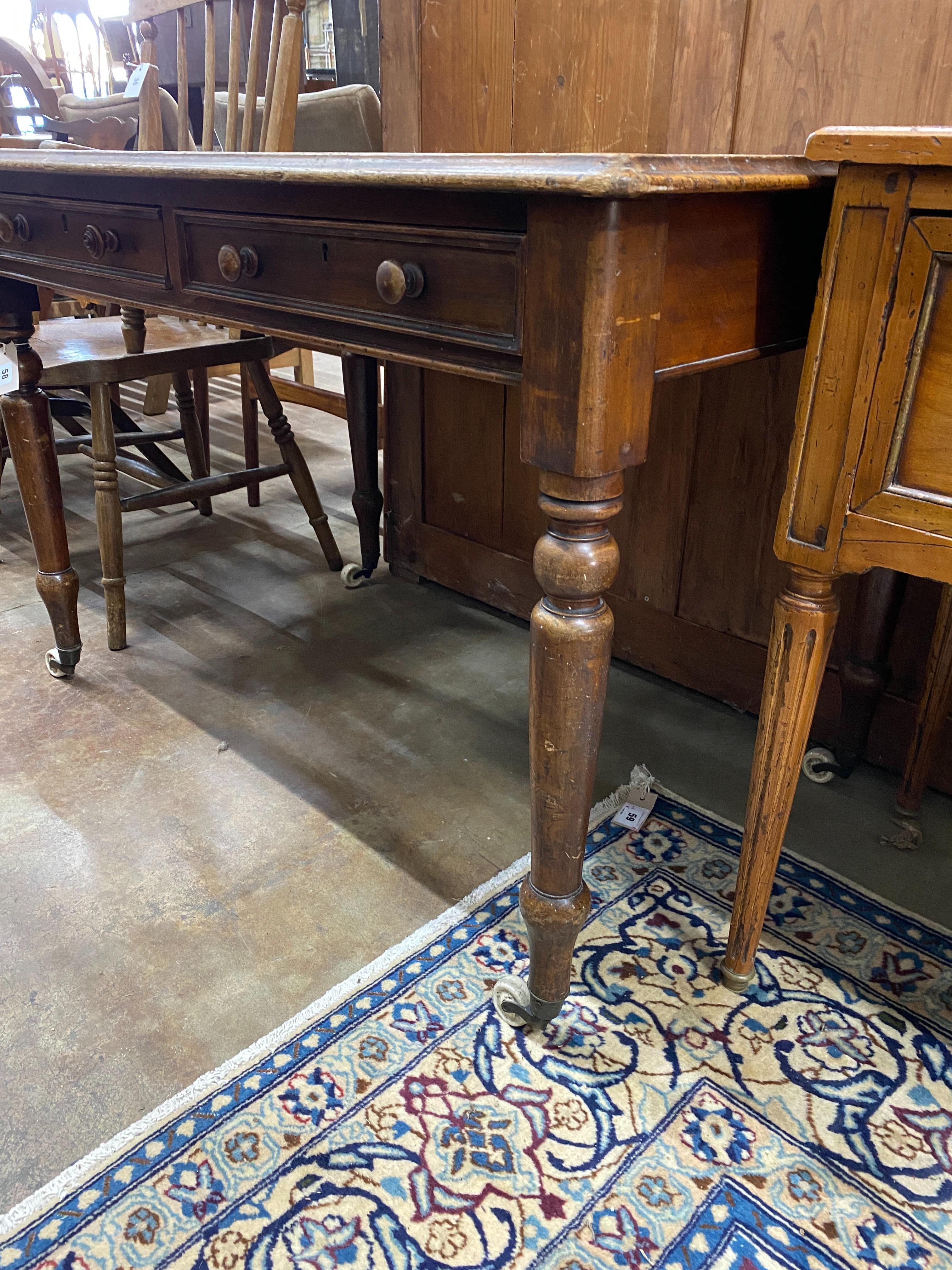 A Victorian mahogany two drawer writing table, width 106cm, depth 68cm, height 73cm